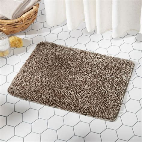 Enhanced with ultra absorbent fibers and a non-skid backing makes it the perfect mat for beside the bath and ensures a dry pup. . Home dynamix bath mat